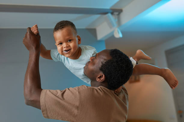 istock Father Playing with Baby Boy 1403951723