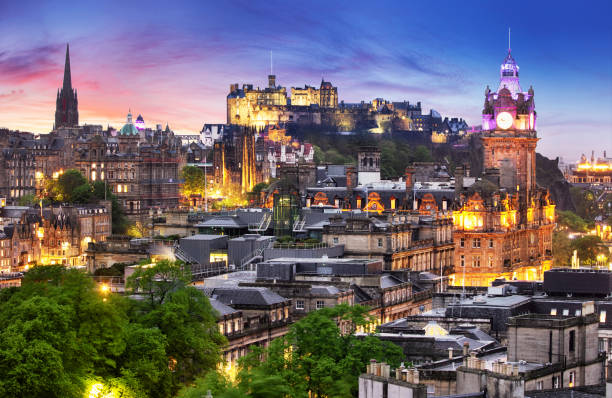 istock Edinburgh skyline at night with castle in Scotland, UK 1403952263