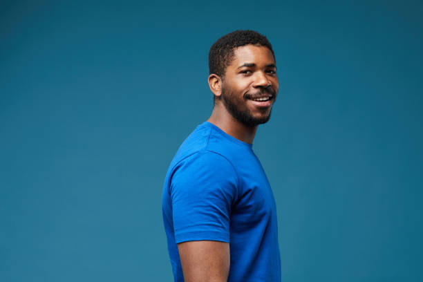 istock Smiling African American Man in Blue 1403952370