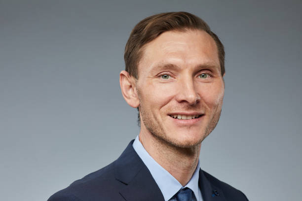 istock Businessman on Grey Closeup 1403952377