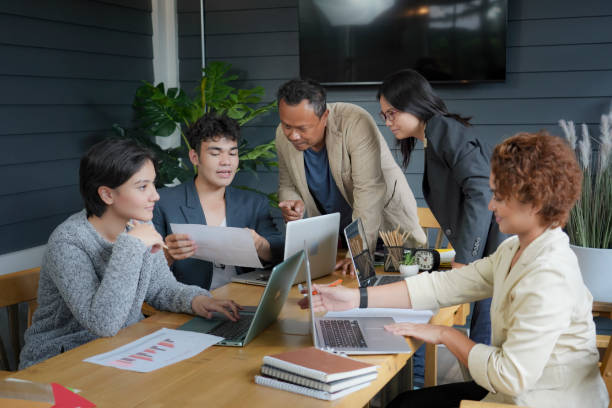 istock Candid of people office presentation meeting. 1403953630