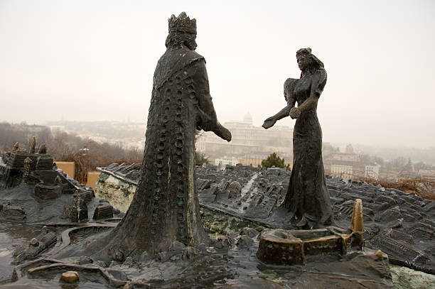 king and queen statue over budapest stock photo