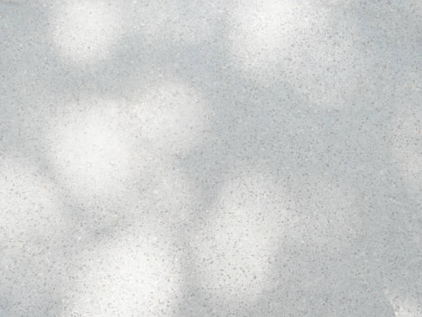 istock Natural and abstract shadows on flooring stone wall texture 1403954494