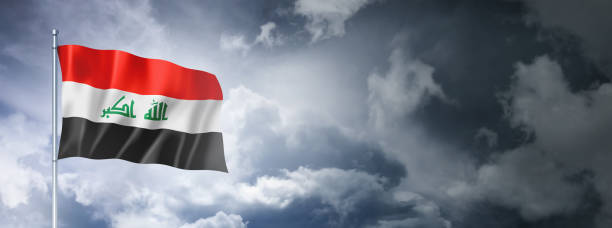 istock Iraqi flag on a cloudy sky 1403954705