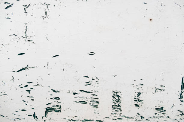 istock Cracked white paint on an abstract metal background 1403956907