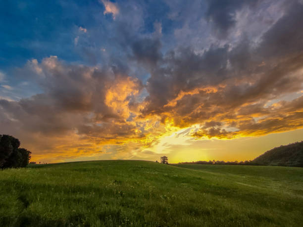 istock Sunset with spectacular cloud formation in a quiet landscape 1403956982