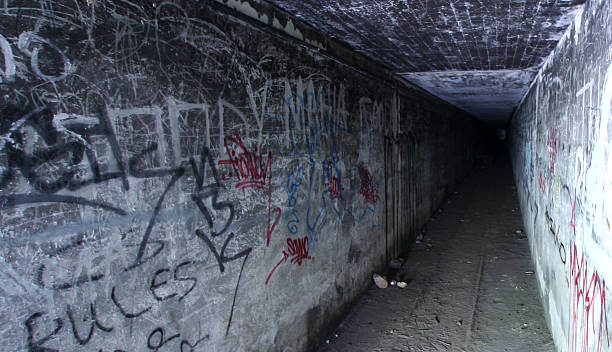 istock tunnel with grafitti 140395752