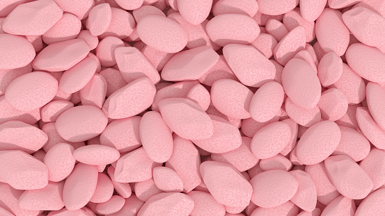 Pebbles background pink color stones
