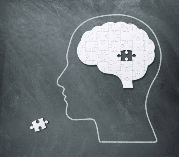 istock Jigsaw puzzle in the shape of human brain 1403958085
