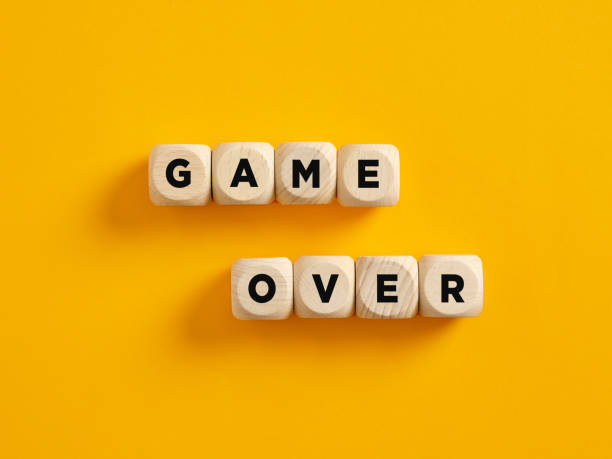 istock The word game over on wooden cubes. Failure, loosing or gaming 1403958521