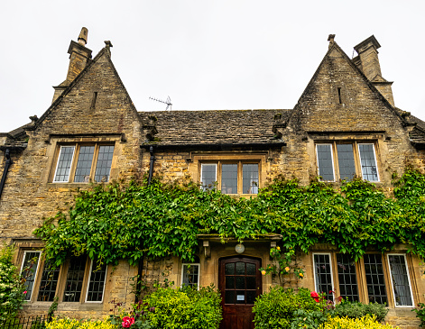 Bourton-on-the-Water, Gloucestershire, United Kingdom - June 05, 2022:  Vintage architecture of Cotswolds area