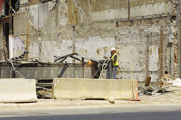 istock Construction Worker Cutting Scrap Metal with Oxygen-Acetylene Torch Demolition Site 140396159