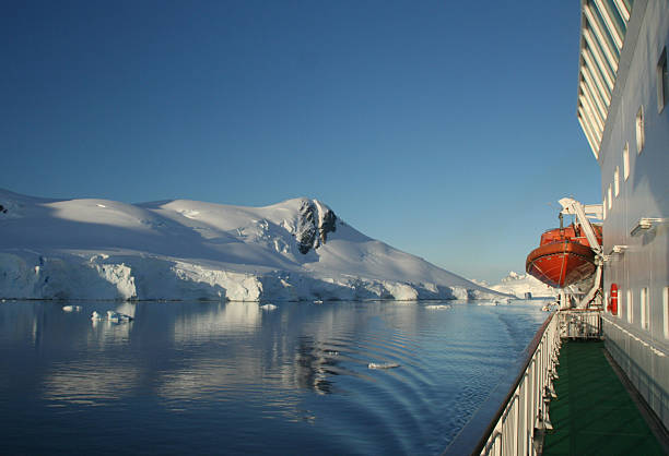 istock Cruise ship with lifeboat, mountains 140396195
