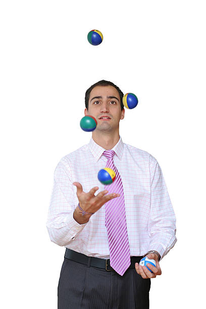 istock Businessman juggling his priorities 140396405