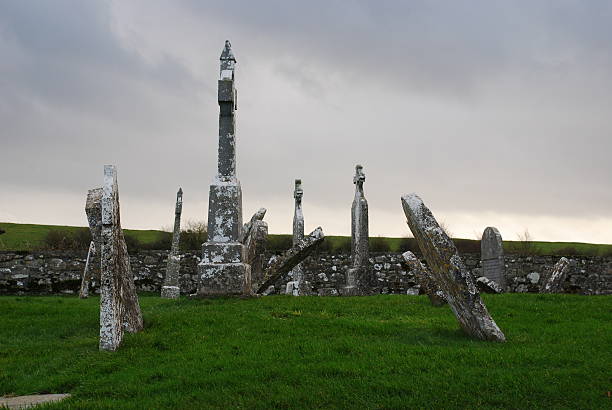 Clonmacnoise: tilted gravestones stock photo