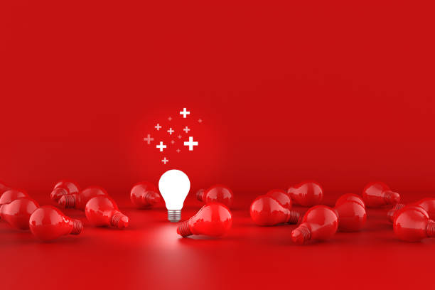 istock Light bulbs on red background. Positive idea thinking concept. 3D Illustration. 1403966345
