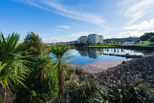 istock Beautiful scene of waterfront with building in background. 1403967120