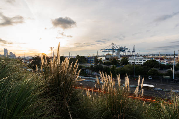 The view of sea port in industry city at dusk.