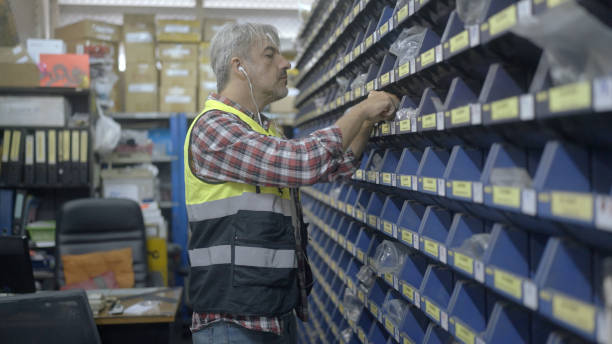 istock Employee is checking the goods in the warehouse. 1403967501
