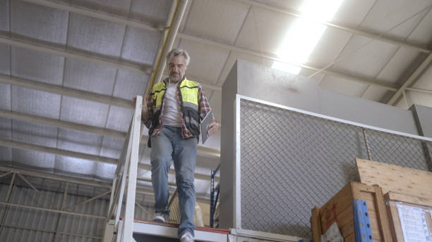 istock Employee is checking the goods in the warehouse. 1403968418