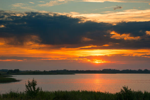 istock Serene landscape with a lake lake in the evening 1403969267