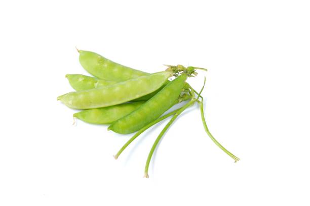 istock fresh green peas isolated on a white background 1403969414