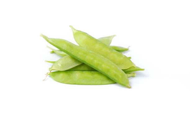 istock fresh green peas isolated on a white background 1403969420