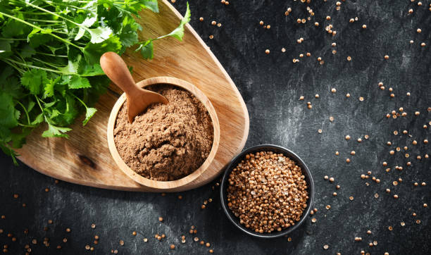 istock Ground coriander, its dried seeds and fresh leaves 1403969444