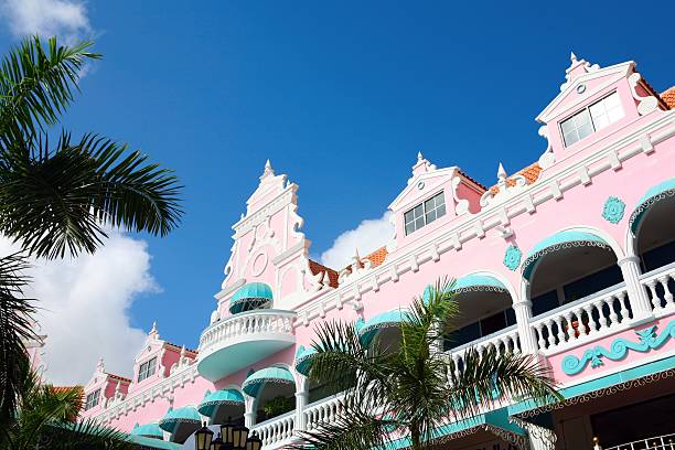 istock Low angle of a pink and Aqua building in Aruba 140397043