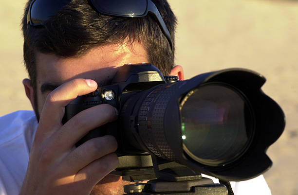 istock male photographer 140397094