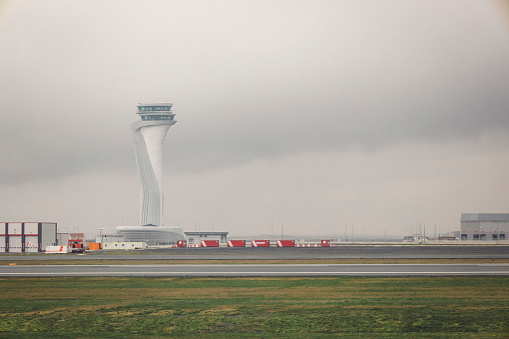 Command tower on the airport. Airport view of a clody day.