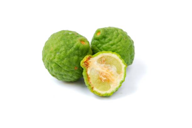istock sliced bergamot isolated on a white background 1403972376