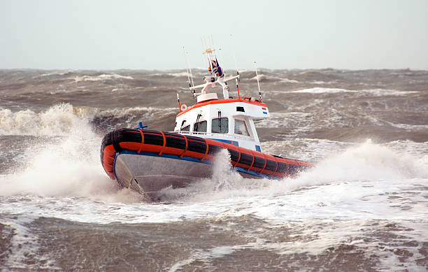 coast guard - buoy safety rescue rubber stock-fotos und bilder