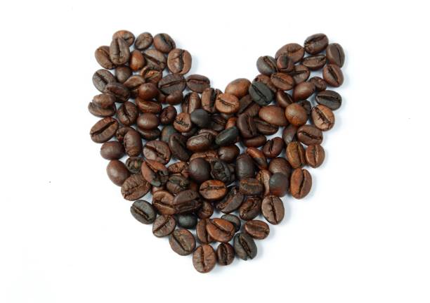 istock Love shape of coffee beans isolated on white background 1403974000