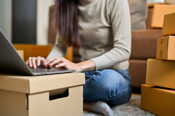 istock A female freelancer, online shop owner replying her customer question via laptop computer. 1403974103