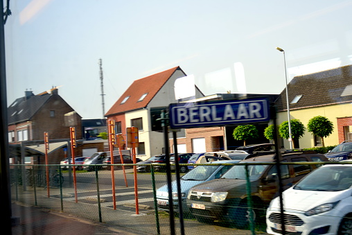 Berlaar, Vlaams-Brabant, Belgium - June 18, 2022: blurred view photographed from a moving train on Flemish landscape