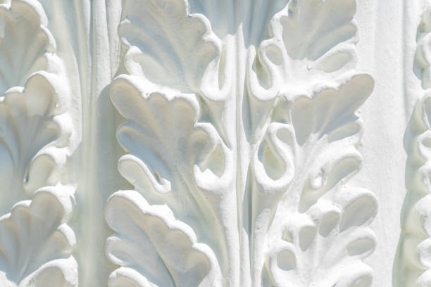 Gypsum stucco moulding plasterwork abstract background. White gypsum abstract background. Decorative stucco element concept of fletwork.
