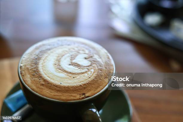 Hot Coffee With Beautiful Latte Art Topping Serve On Table Stock Photo - Download Image Now