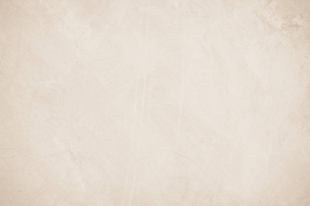 istock Old concrete wall texture background. Close up retro plain beige color cement material surface rough for show or advertise promote product content on display and brown paper design element concept. 1403977541