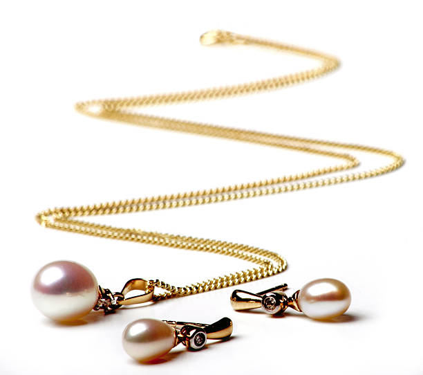 istock pearl necklace and earings 140397878