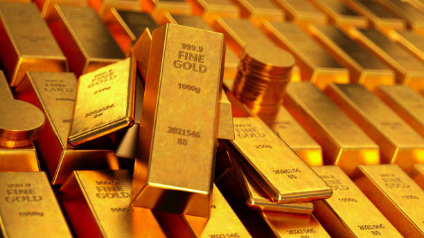 Stack of Gold Bars Ingots and Coins stock photo