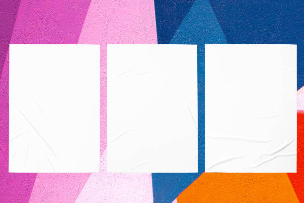 istock abstract colorful urban wall with three glued posters 1403979507