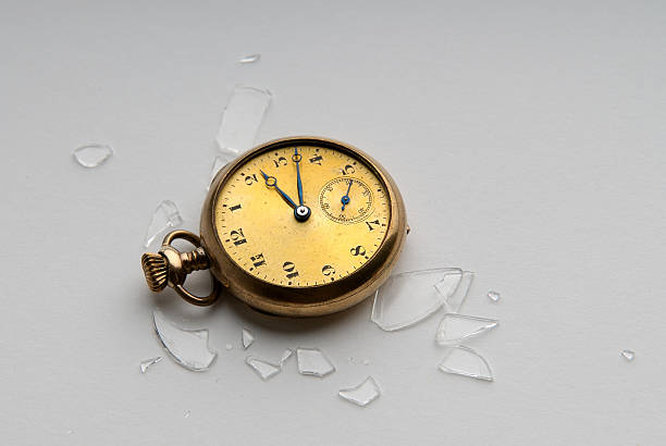 istock Antique gold watch with shattered crystal 140398138
