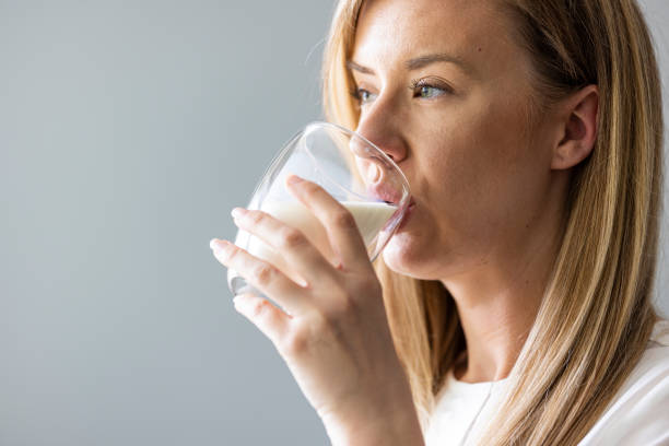 istock Woman drinking fresh milk 1403985133