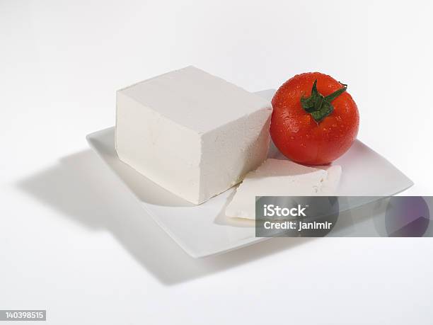 Foto de Com Tomate E Queijo Feta e mais fotos de stock de Branco - Branco, Comida grega, Fotografia - Imagem