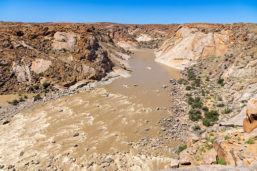 The Oranje river flowing in the Augrabies National Park.  The area is known as the Oranjekom.