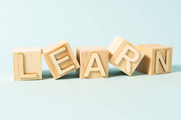 istock LEARN word on wooden cubes 1403987357