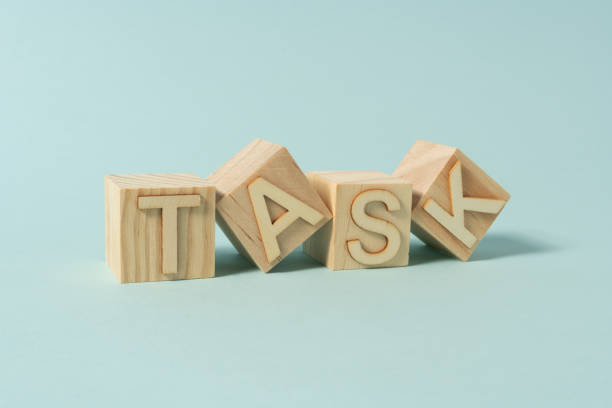 istock Sign TASK on wooden cubes 1403987498