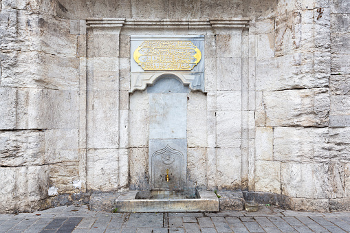 An old water tap on the street in Istanbul, Turkey