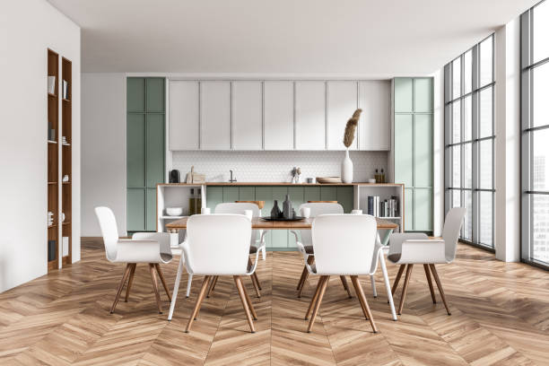 istock Kitchen interior with eating table and seats, island and panoramic window 1403989211